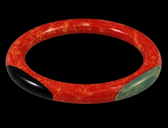 older Shultz marbled orange red tube bangle/oval dots